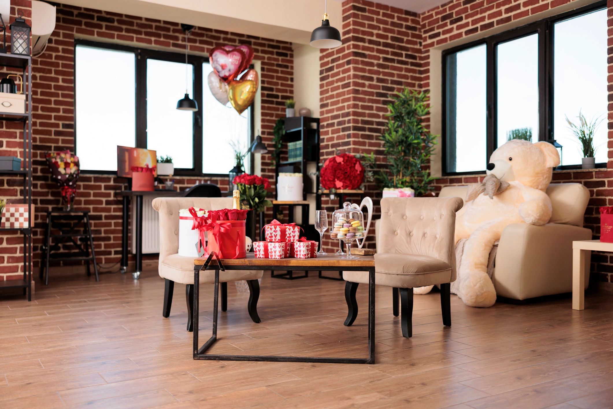Festive anniversary room styling with balloons and gifts